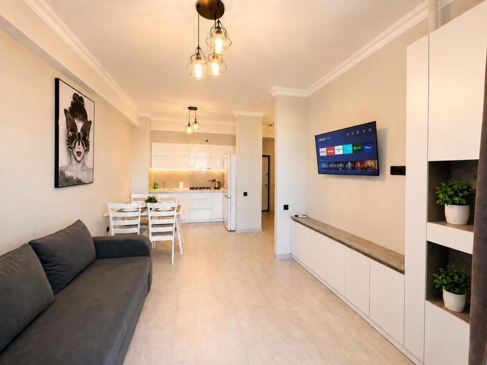 Kitchen or kitchenette, Living room, Seating area, Dining area
