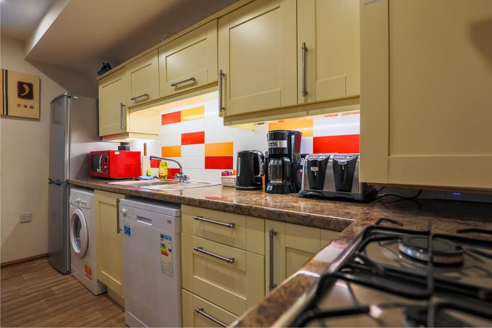 Kitchen or kitchenette, dishwasher, oven, pet friendly, stove, toaster, washing machine, kitchen