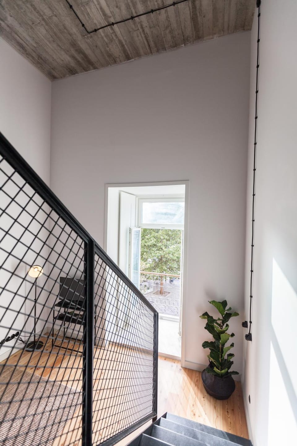 FLH Intendente Industrial Mezzanine with Balcony Apartment in Lisbon