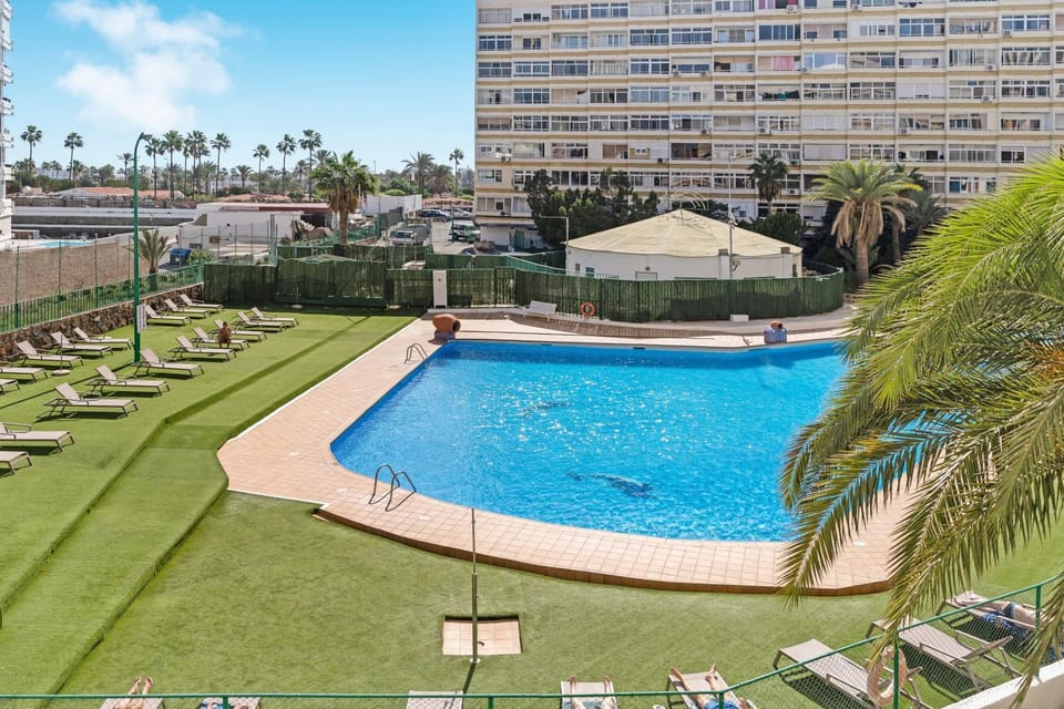Property building, Living room, Swimming pool
