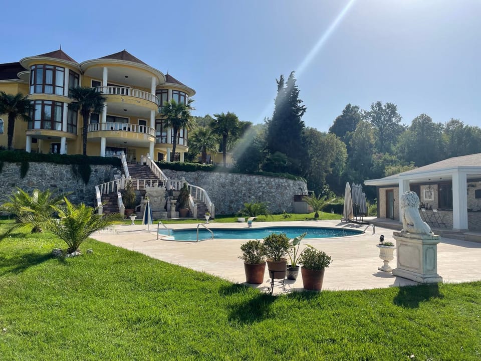 Property building, Patio, Day, Garden, Garden view, Pool view, Swimming pool