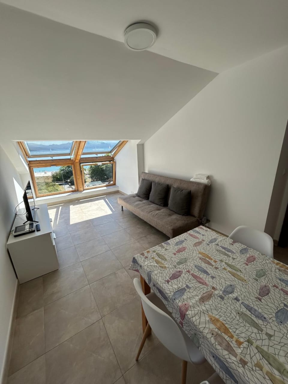 Bed, Living room, Seating area, Dining area
