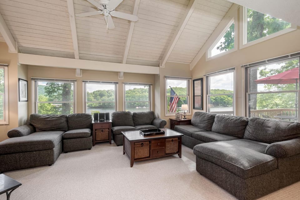 View (from property/room), Living room, Seating area, Lake view, furniture