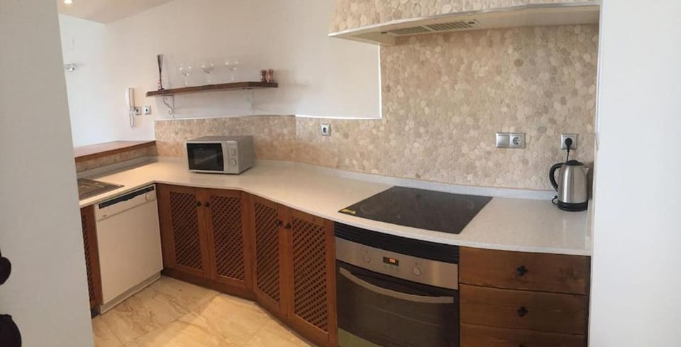 Kitchen or kitchenette, stove