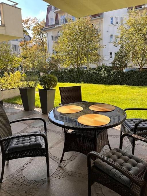 Property building, Patio, Spring, Day, Garden, View (from property/room), Balcony/Terrace, Living room, Seating area, Dining area, Garden view