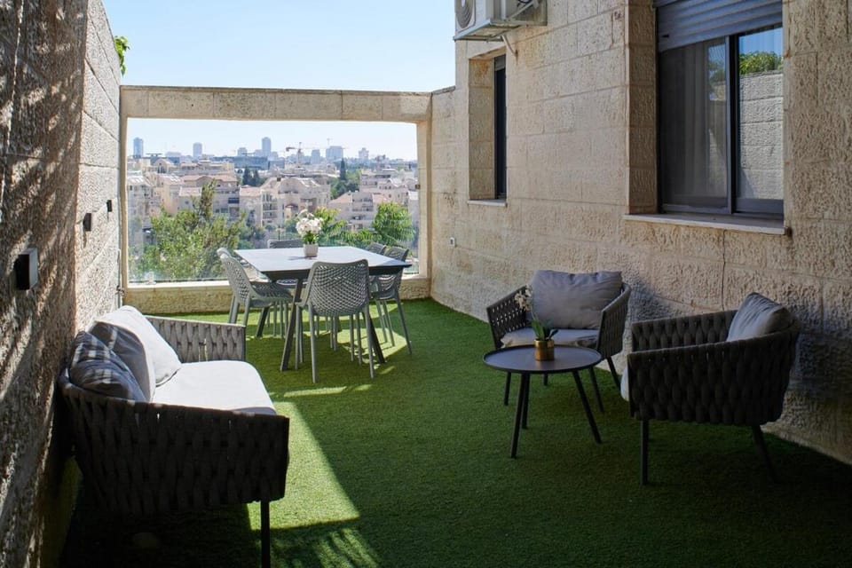 View (from property/room), Balcony/Terrace, Seating area, City view