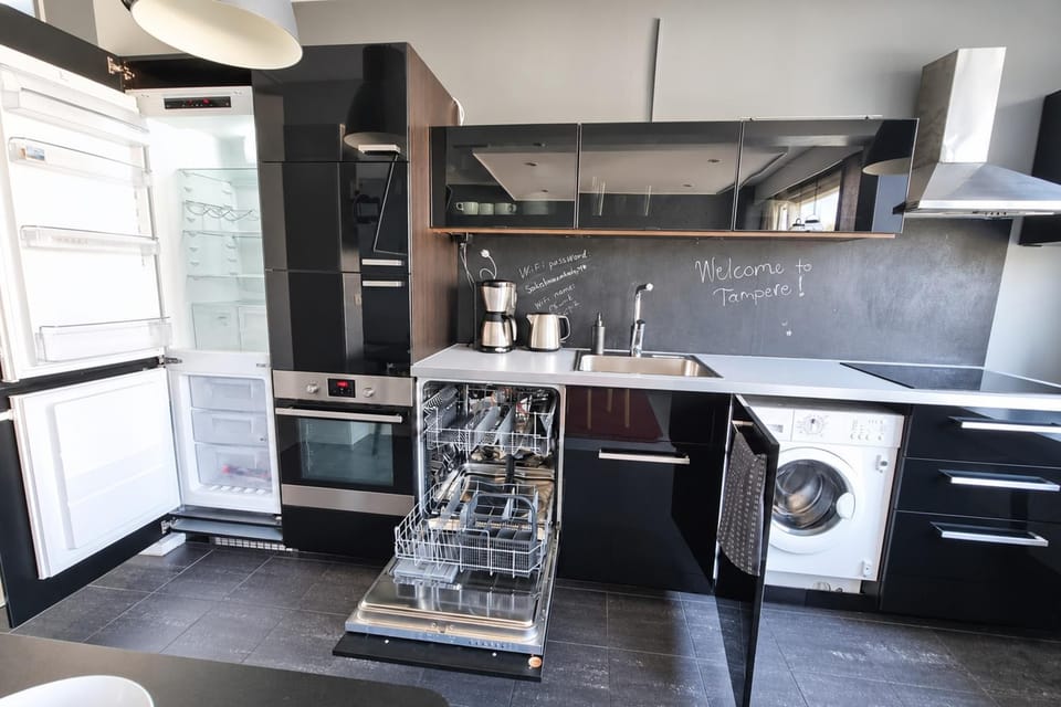 Kitchen or kitchenette, dishwasher, oven, stove, washing machine