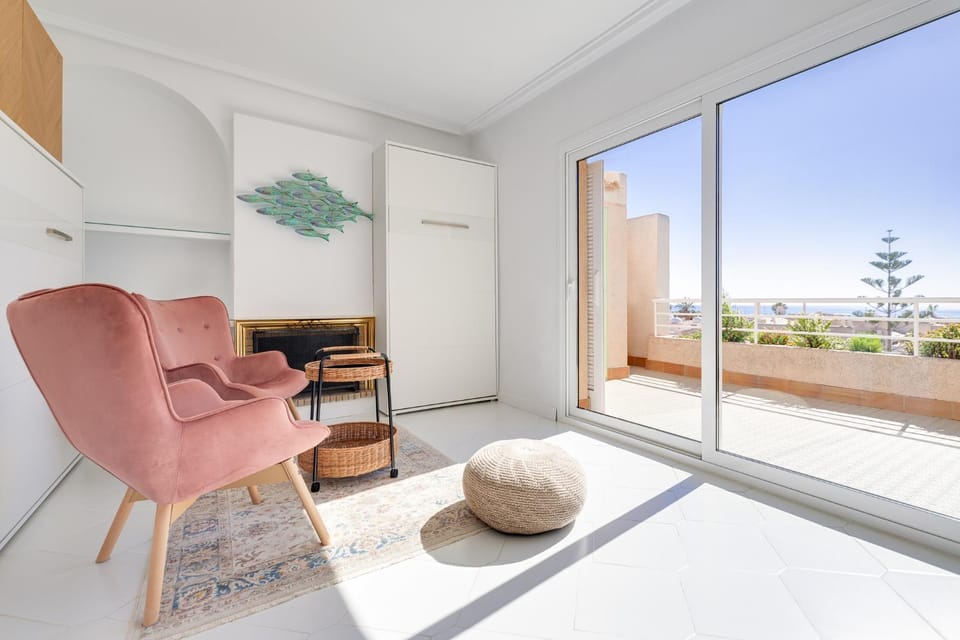 View (from property/room), Balcony/Terrace, Living room, Seating area, Sea view, flat iron