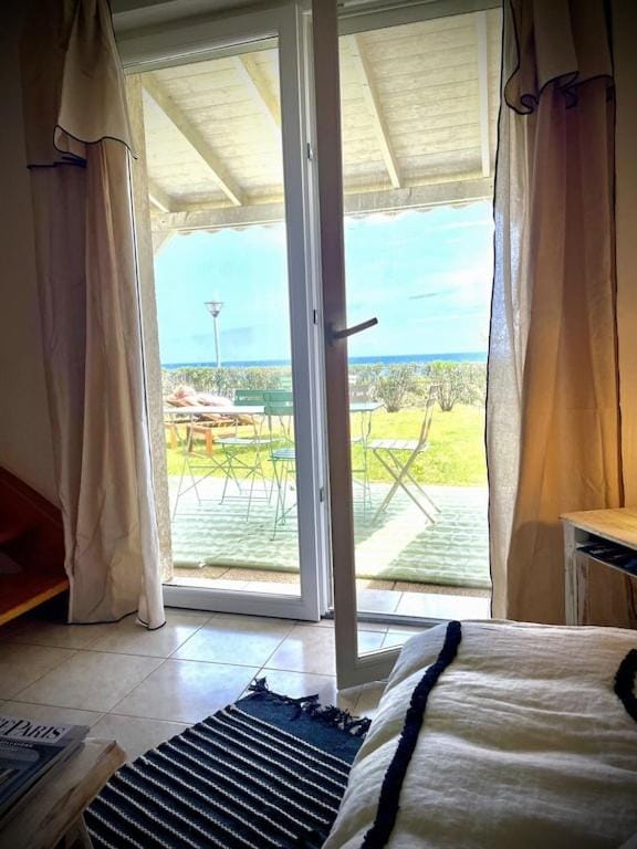 View (from property/room), Living room, Seating area, Sea view