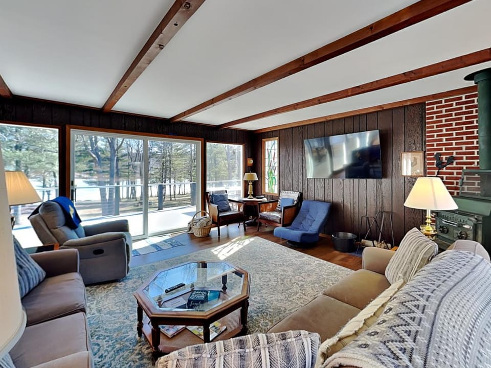 TV and multimedia, Living room, Seating area, Lake view, fireplace, furniture