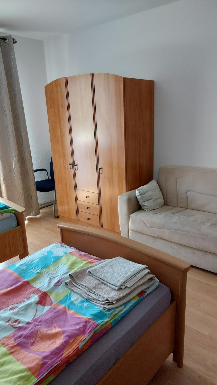 Bed, Photo of the whole room, Seating area, towels, wardrobe