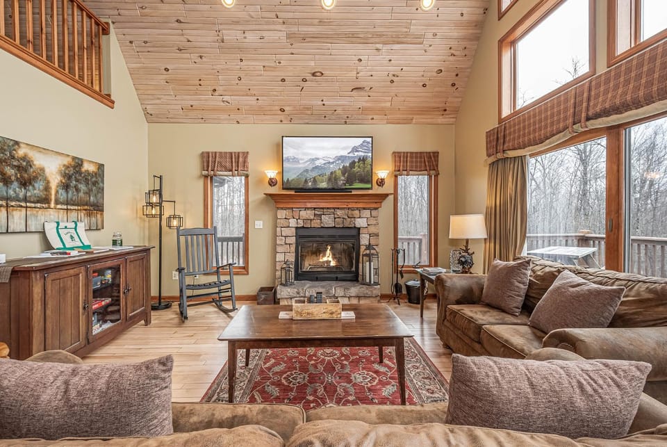 TV and multimedia, Living room, Seating area, Garden view, fireplace, furniture