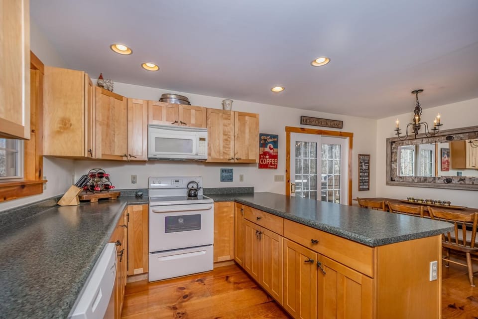 Kitchen or kitchenette, Dining area, furniture, microwave, oven, stove