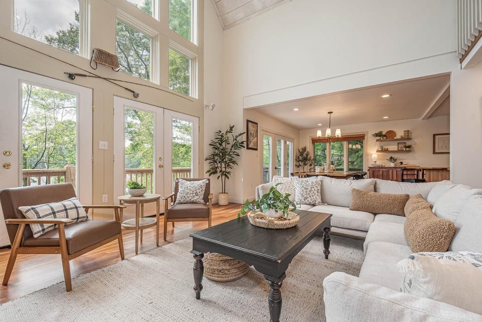 View (from property/room), Living room, Seating area, Garden view, furniture, kitchen