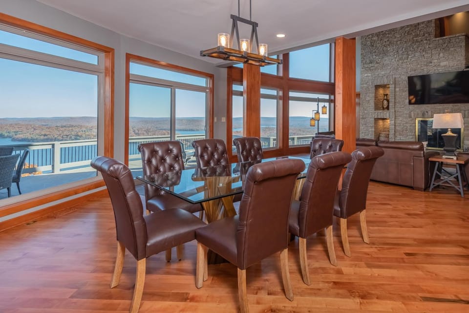 View (from property/room), Living room, Seating area, Dining area, Lake view, furniture