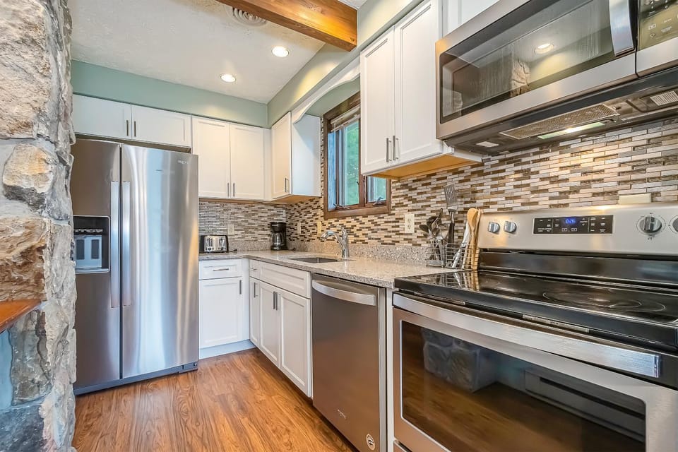 Kitchen or kitchenette, furniture, microwave, oven, stove, kitchen