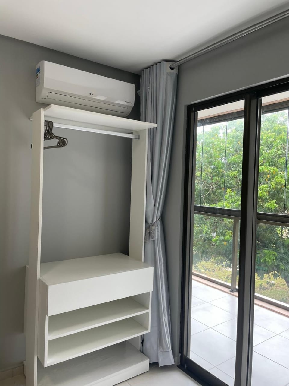 Photo of the whole room, wardrobe, air conditioner