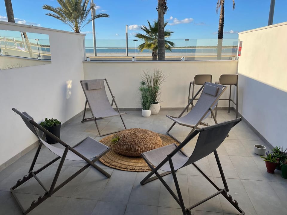 Natural landscape, View (from property/room), Balcony/Terrace, Living room, Beach, Sea view, sunbed