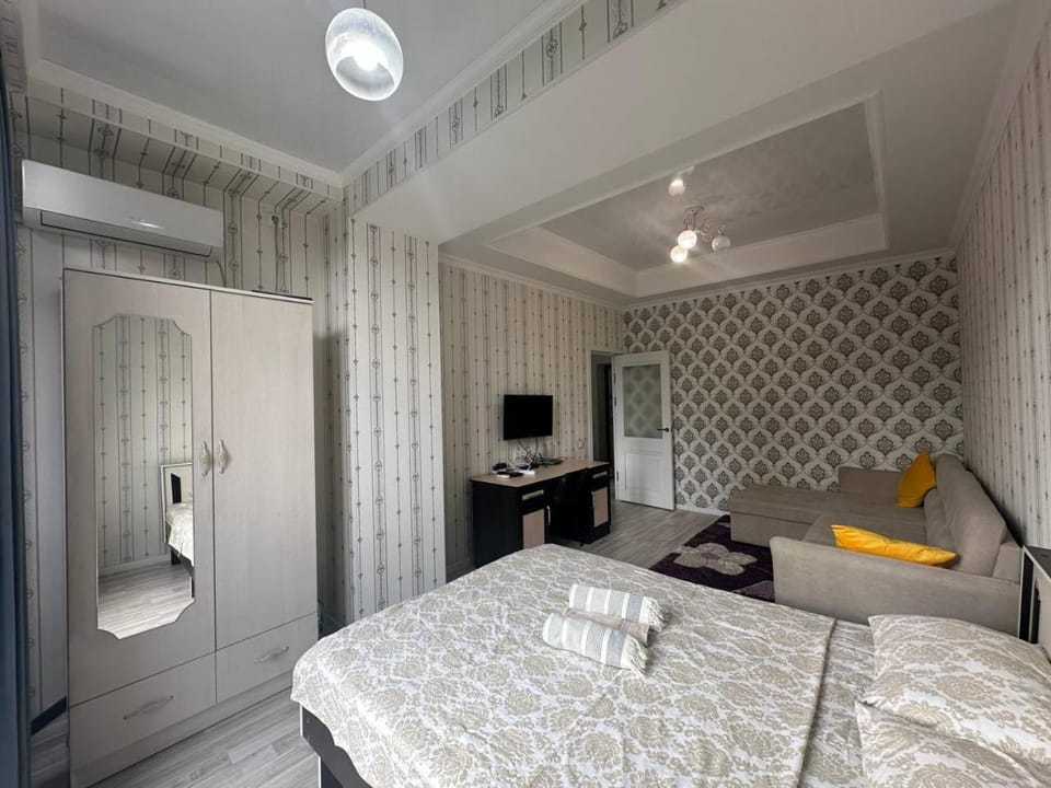 Bed, TV and multimedia, Bedroom, towels, wardrobe