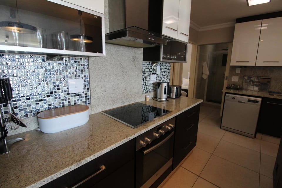 Kitchen or kitchenette, oven, stove, toaster