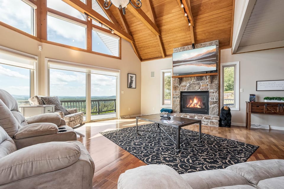 View (from property/room), Living room, Seating area, Mountain view, fireplace, furniture