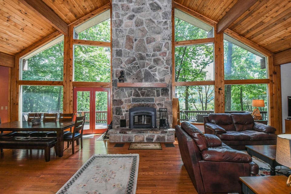 View (from property/room), Living room, Seating area, Garden view, fireplace, furniture