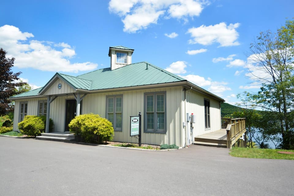 Property building, Facade/entrance, Natural landscape, Lake view, Mountain view, Parking