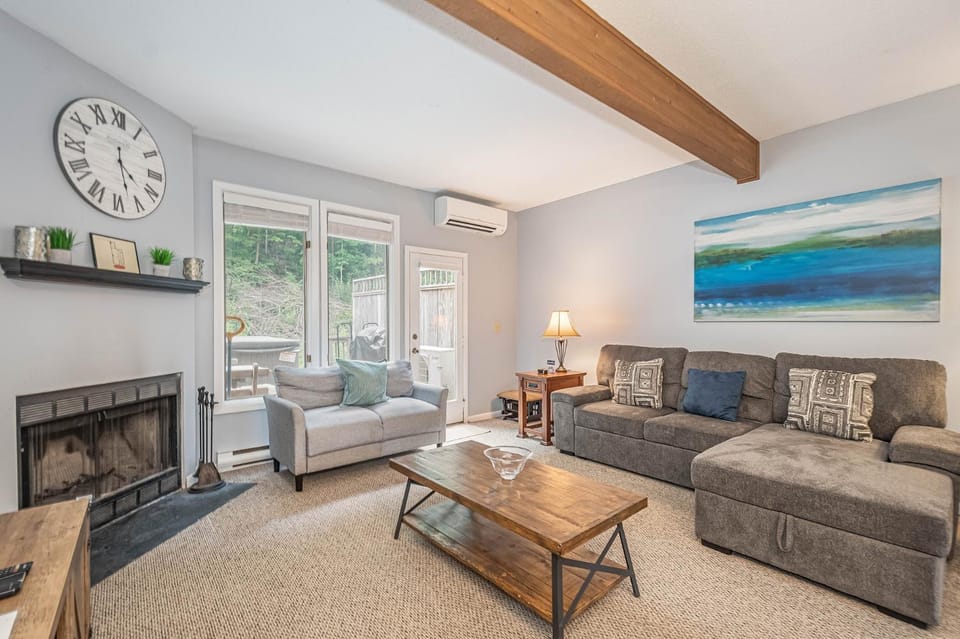 Living room, Seating area, fireplace, furniture, air conditioner