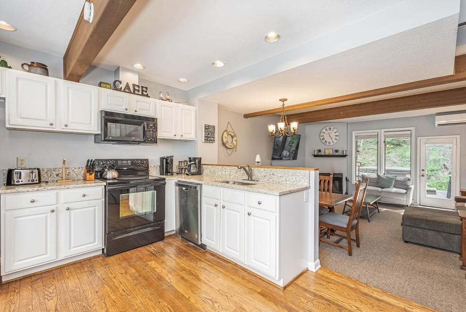 Kitchen or kitchenette, Living room, Dining area, microwave, stove, toaster