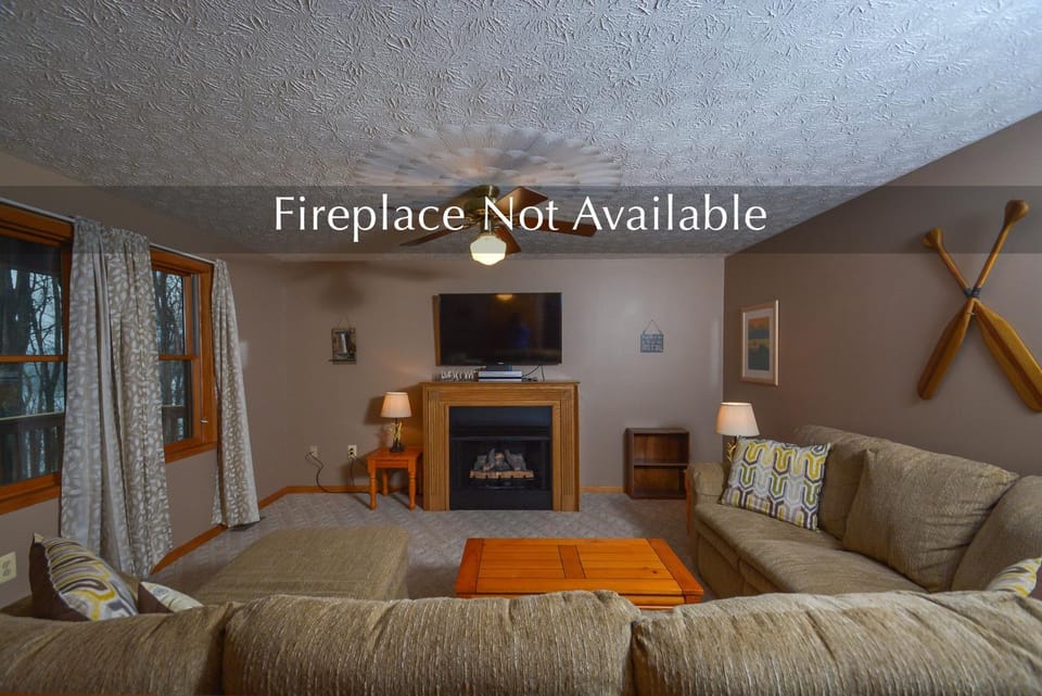 TV and multimedia, Living room, Seating area, Garden view, fireplace, furniture