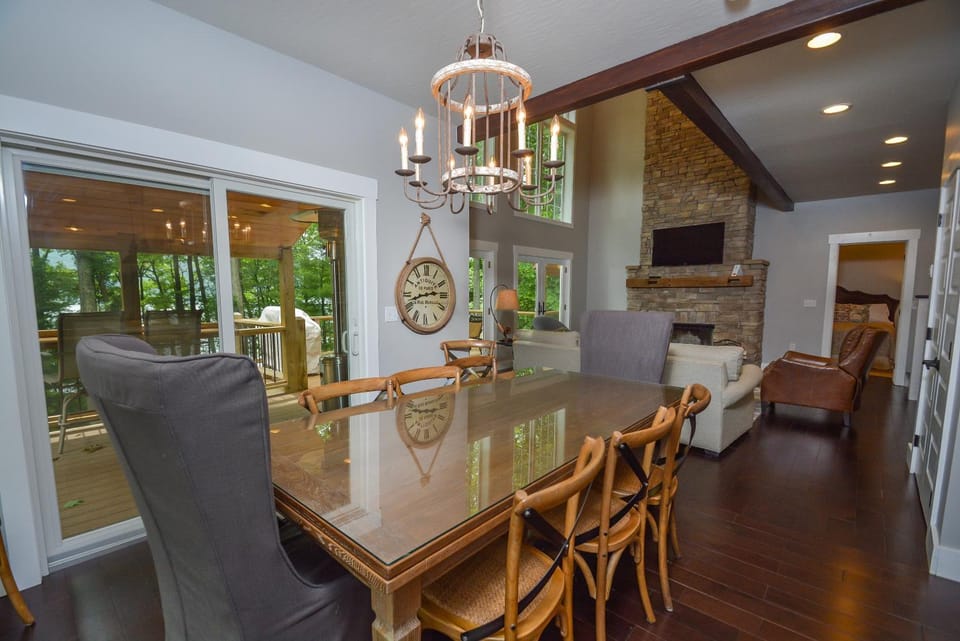 View (from property/room), Living room, Seating area, Dining area, Garden view, fireplace, furniture