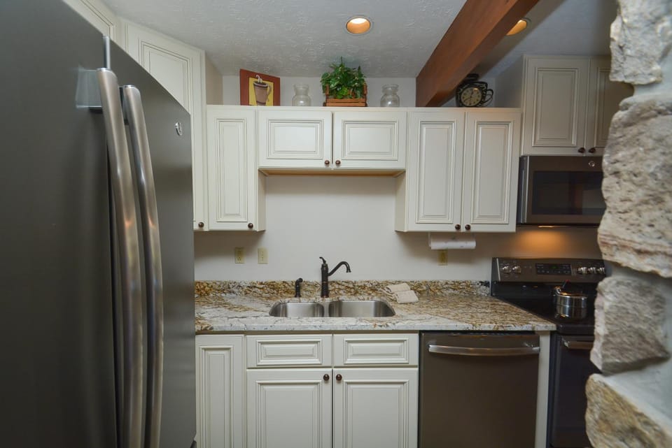 Kitchen or kitchenette, microwave, stove, kitchen