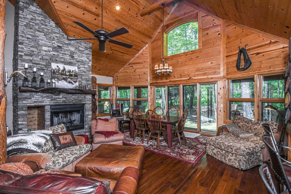 View (from property/room), Living room, Seating area, Dining area, Garden view, fireplace, furniture