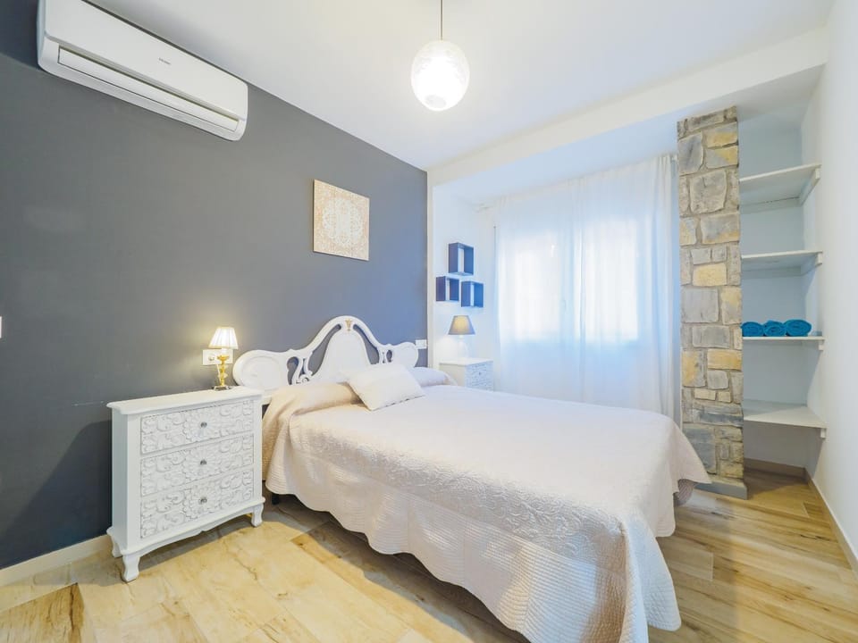 Photo of the whole room, Bedroom, towels, air conditioner