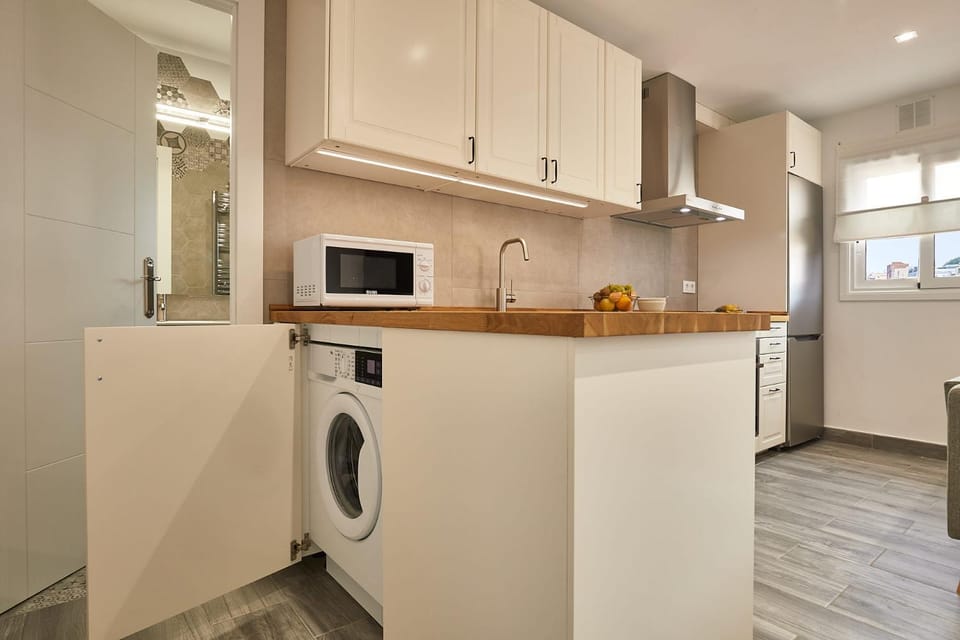 Kitchen or kitchenette, washing machine