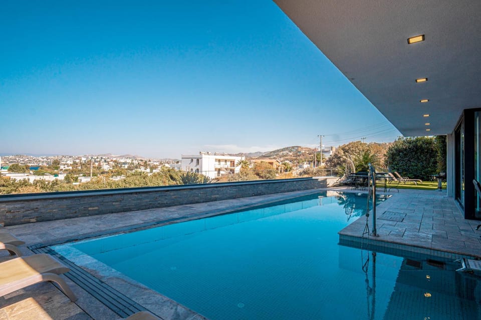 Patio, Day, Natural landscape, Pool view, Swimming pool, sunbed