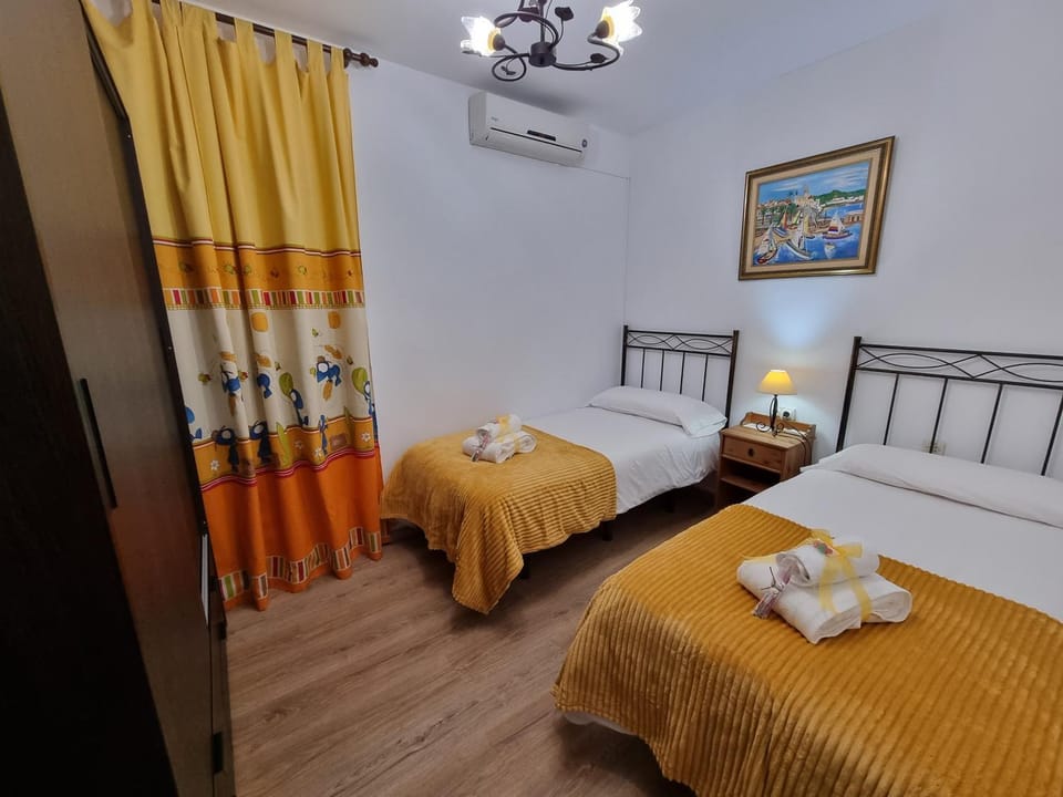 Bed, Photo of the whole room, Bedroom, towels, air conditioner
