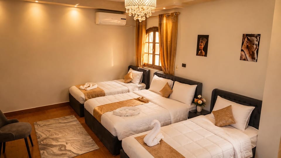 Bed, Photo of the whole room, Bedroom, towels, air conditioner