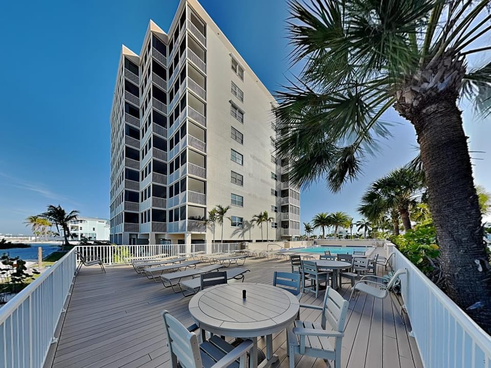 Property building, Patio, Natural landscape, Seating area, Swimming pool