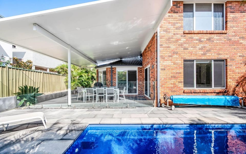 Property building, Day, BBQ facilities, BBQ facilities, Seating area, Pool view, Pool view, Swimming pool, Swimming pool