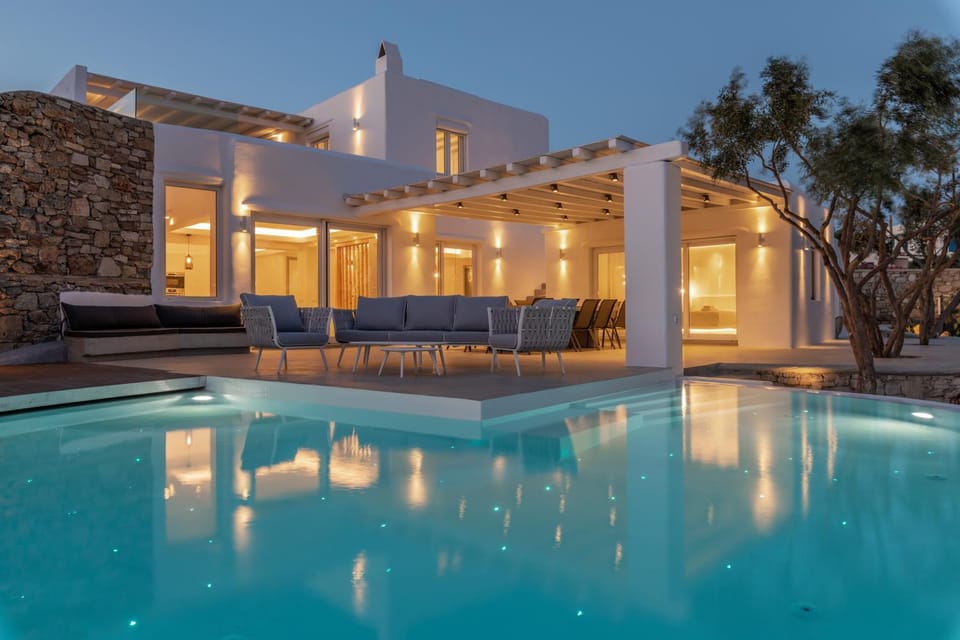Property building, Patio, Night, Pool view, Swimming pool