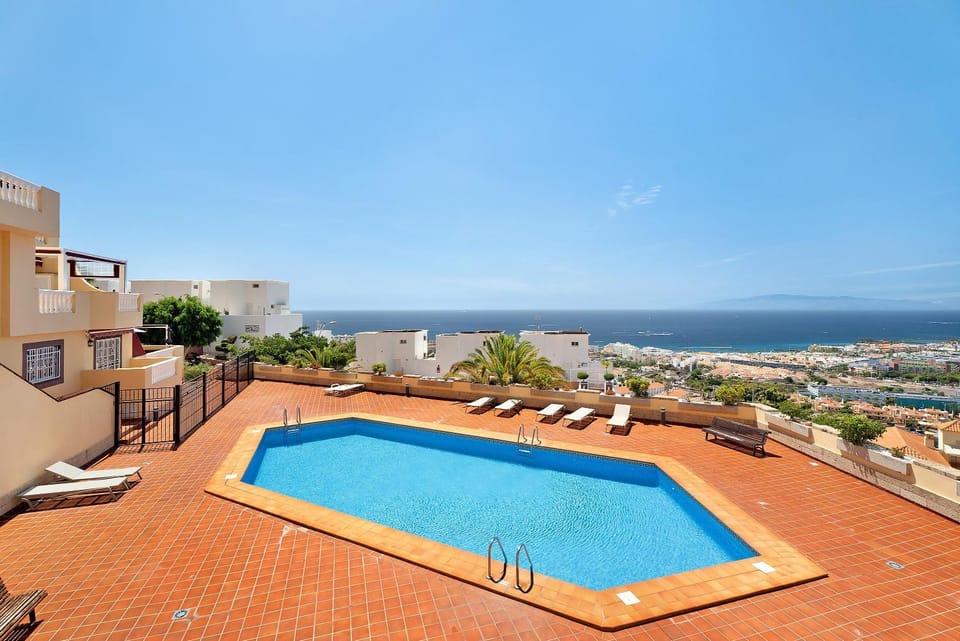 Property building, Living room, Swimming pool