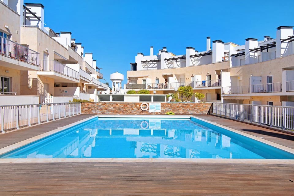 Property building, Living room, Swimming pool