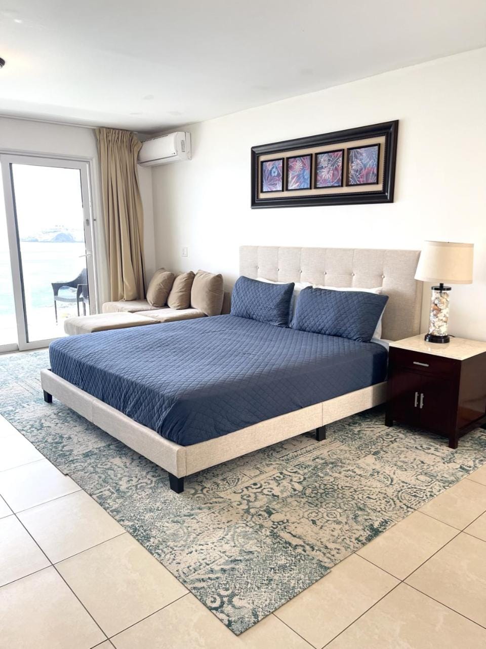 Bed, Living room, Seating area, Bedroom