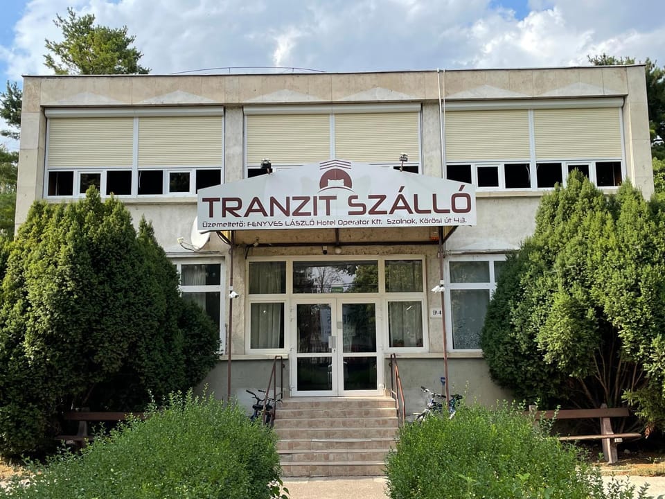 Property building, Facade/entrance, Text overlay