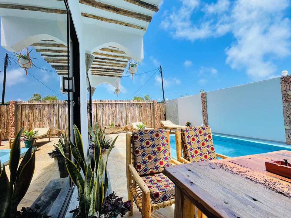 Patio, Day, Pool view, Swimming pool, sunbed