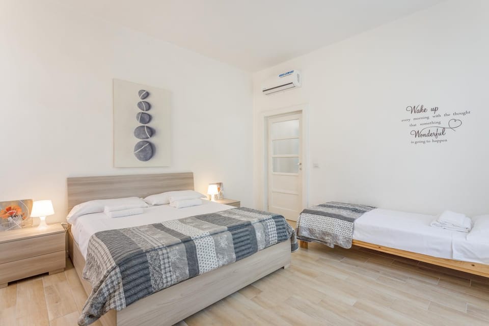 Photo of the whole room, Bedroom, towels, air conditioner