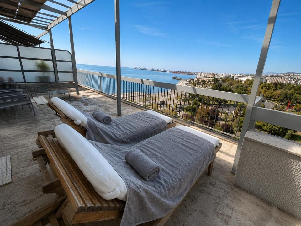 Patio, Bed, Day, Natural landscape, View (from property/room), Balcony/Terrace, Living room, Photo of the whole room, Seating area, Bedroom, Sea view, sunbed
