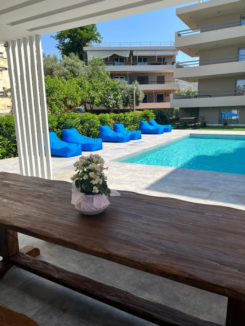 Property building, Day, View (from property/room), Pool view, Swimming pool, sunbed