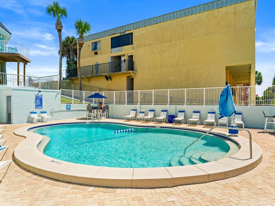 Property building, Seating area, Swimming pool